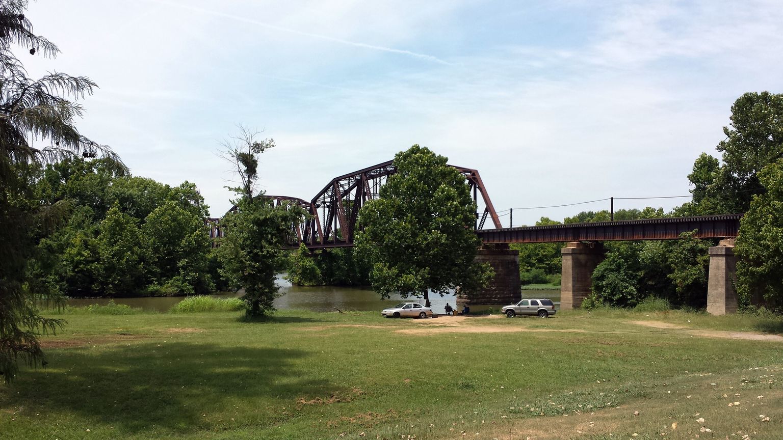 Steel truss railroad bridge crossing the Arkansas River at Van Buren, Arkansas
